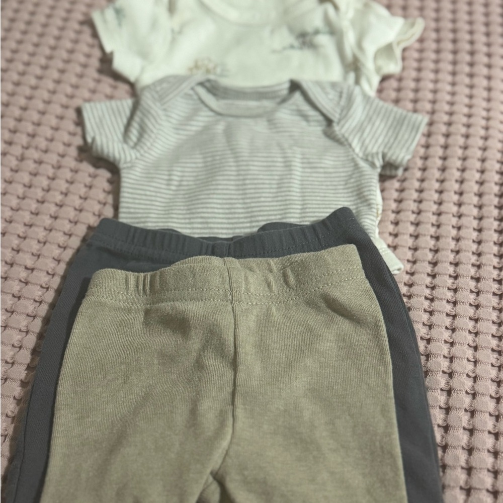 2 Newborn Carter’s sets